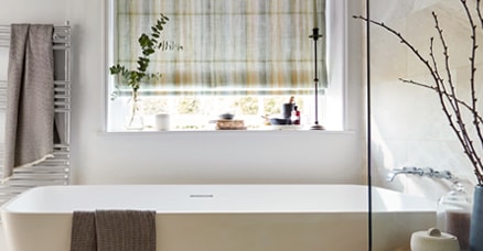 roller blind in a bathroom half up